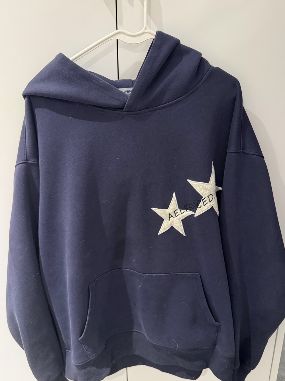 Aelfric Eden hoodie. Size XS, navy with white stars.